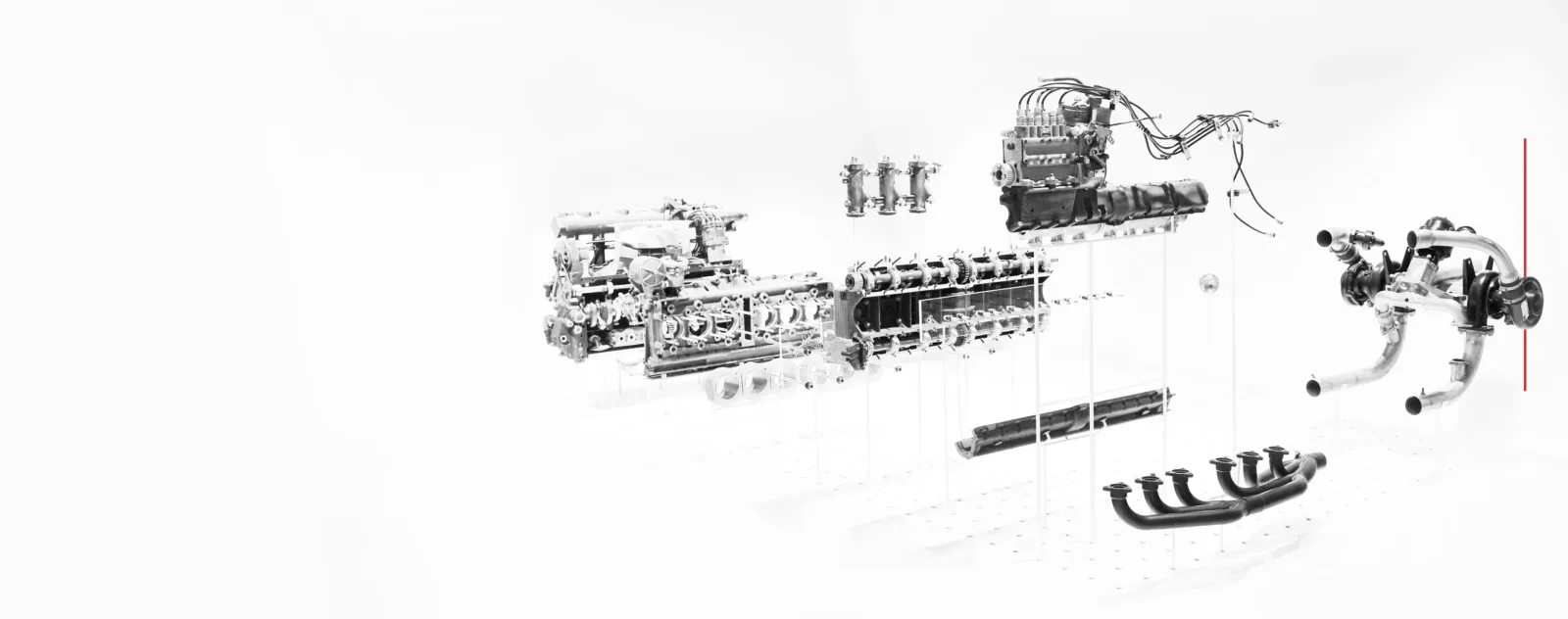 Exploded technical view of an engine and its components
